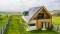 The picture shows a house with solar collectors.