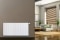 The picture shows a Viessmann radiator on the wall of a modern living space.
