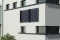 The picture shows Viessmann tube collectors on a house wall.